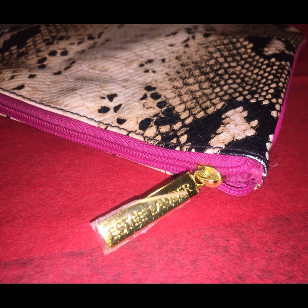 Estée Lauder’s Embossed Snake Print Makeup Bag - Picture 8 of 10